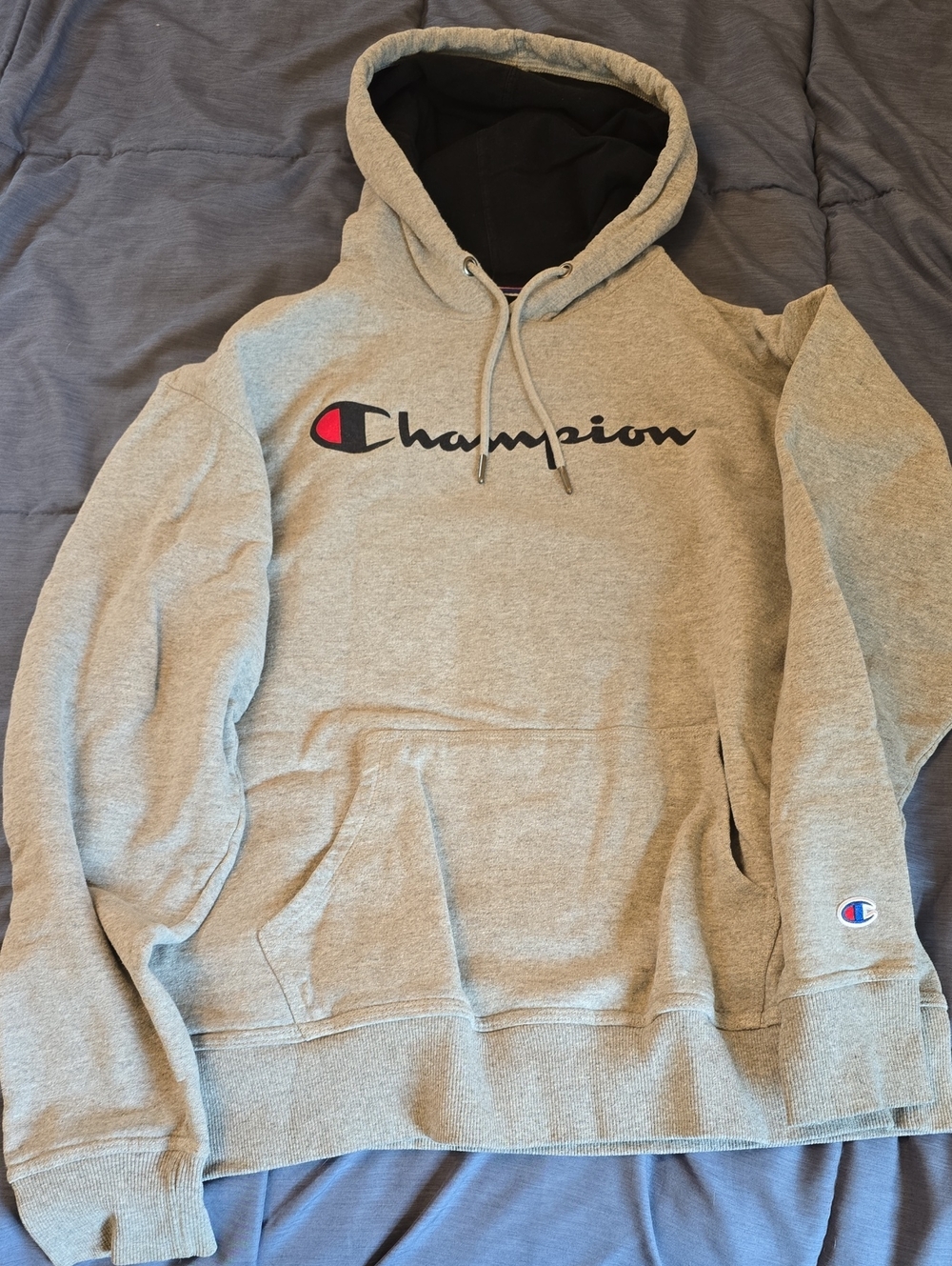 Champion Grey Pullover Hoodie with Black Hood Lining and Red Logo Detail